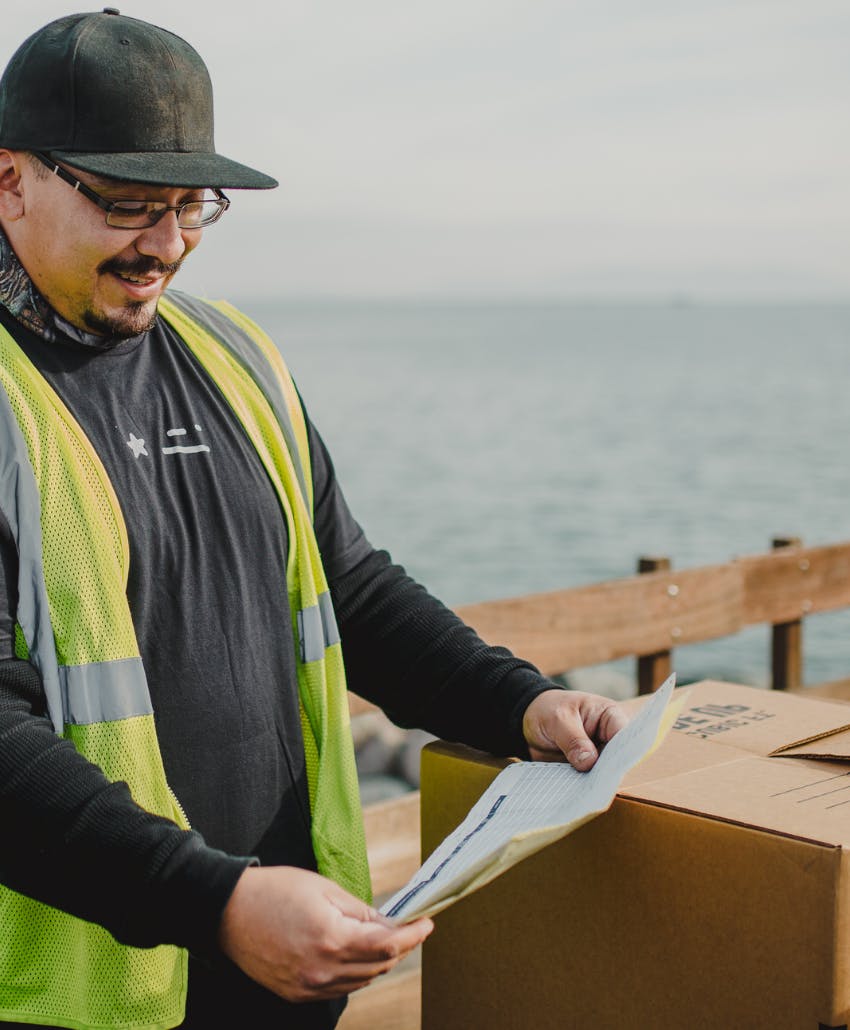 curri driver delivering a package