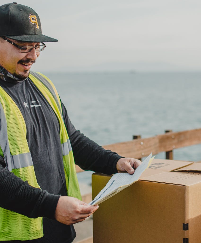 curri driver delivering a package