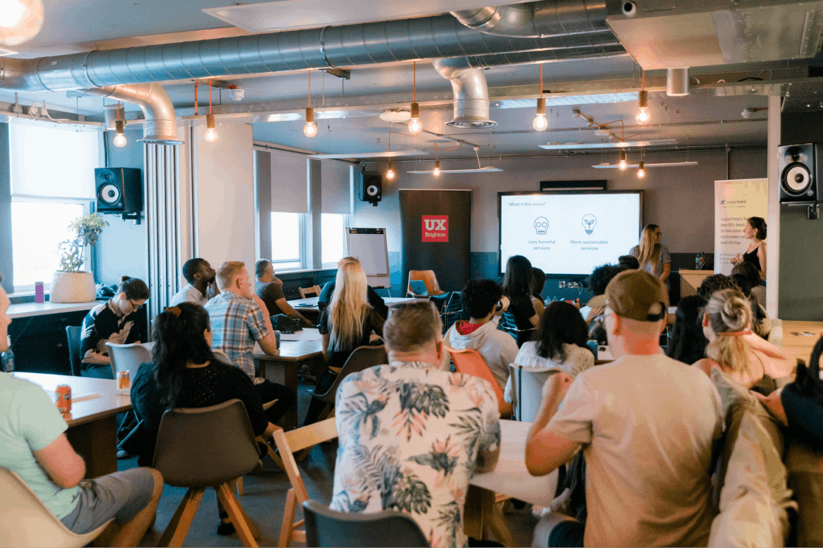 Hannah Whiteley and Nicola Pritchard leading our impact mapping workshop to a room full of people at UX Brighton