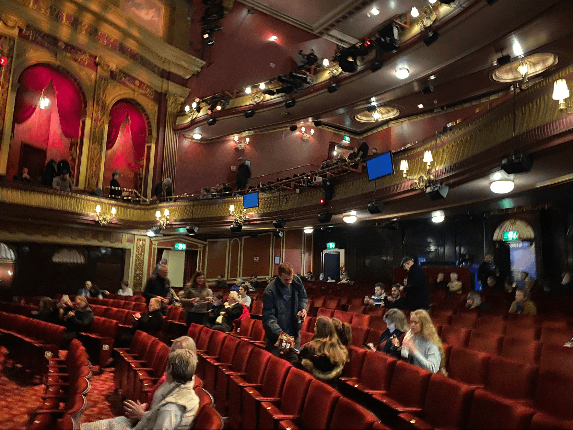 Observing and asking questions to theatre goers in a London theatre.