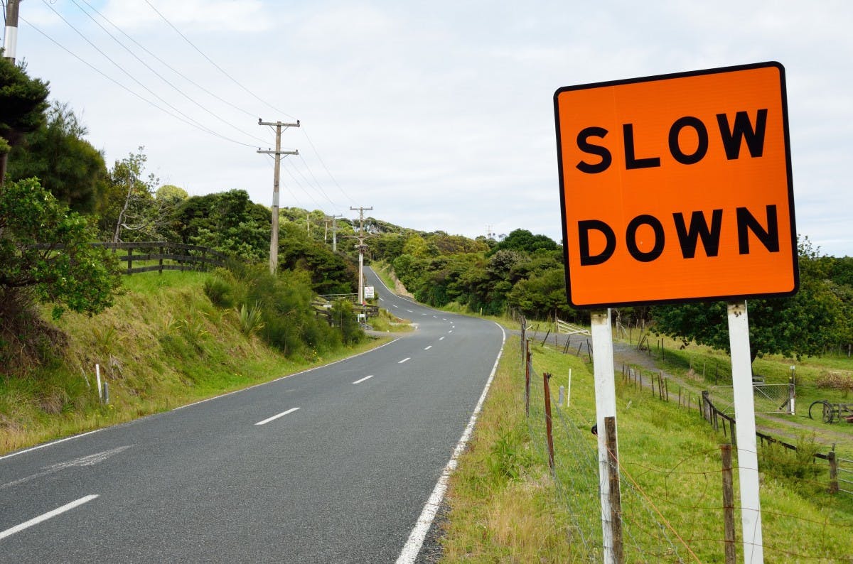 Road sign - Slow down