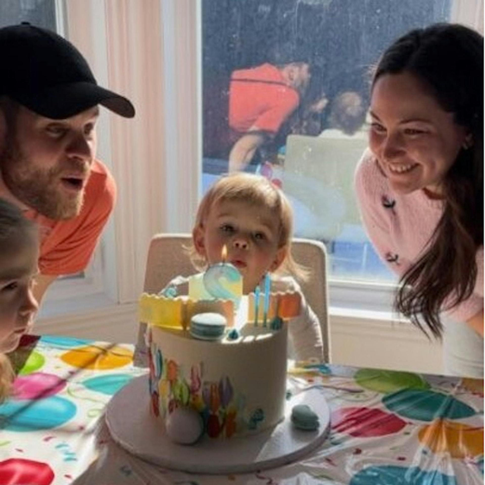 Édouard blows out his birthday candles