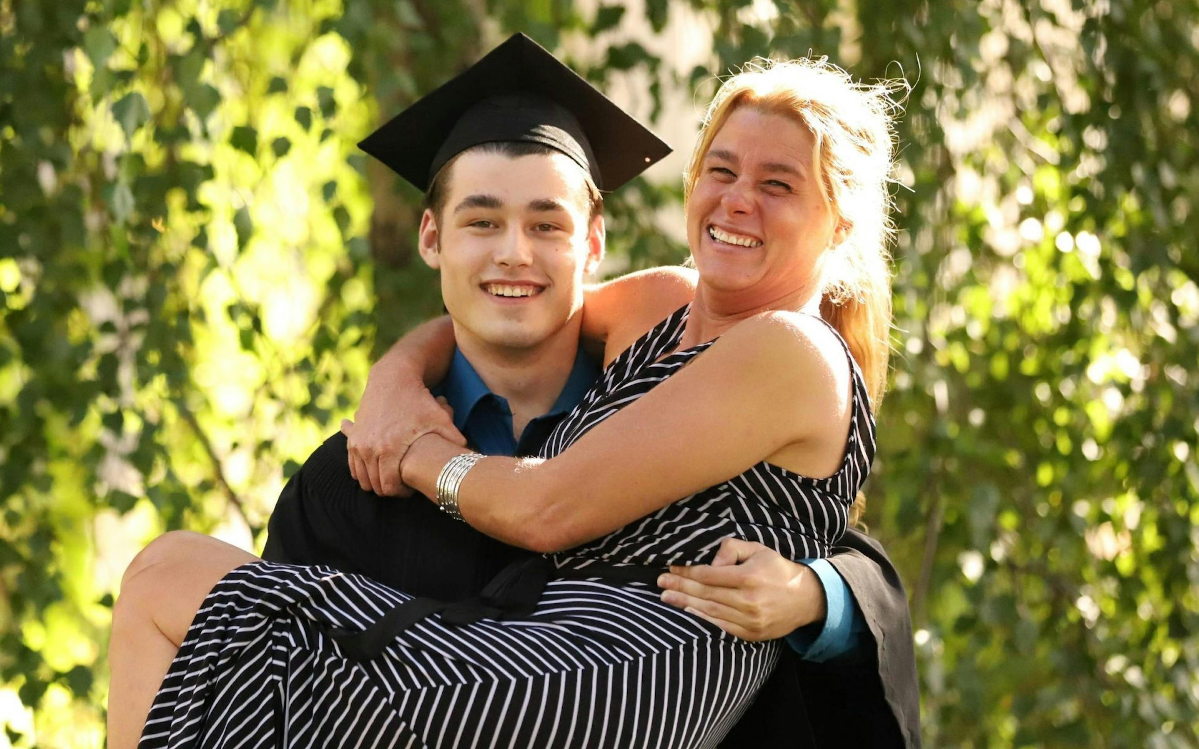 Annie celebrating grad with her son