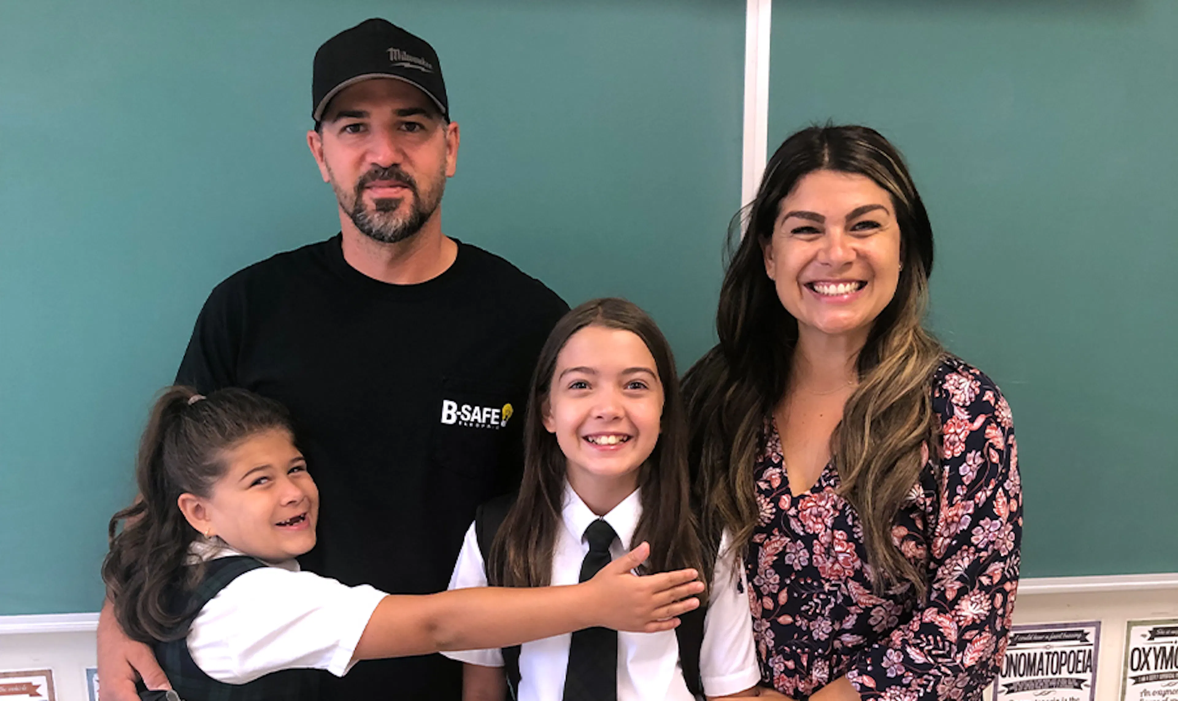 An Elevate member and her family