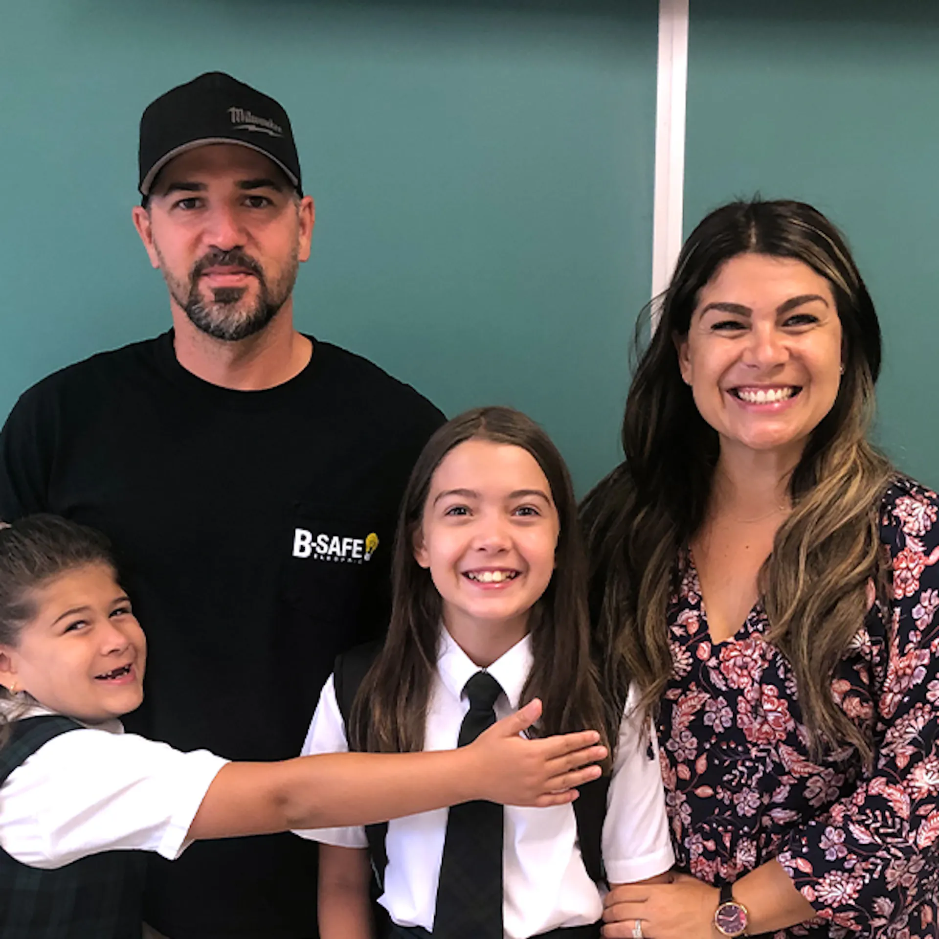 An Elevate member and her family