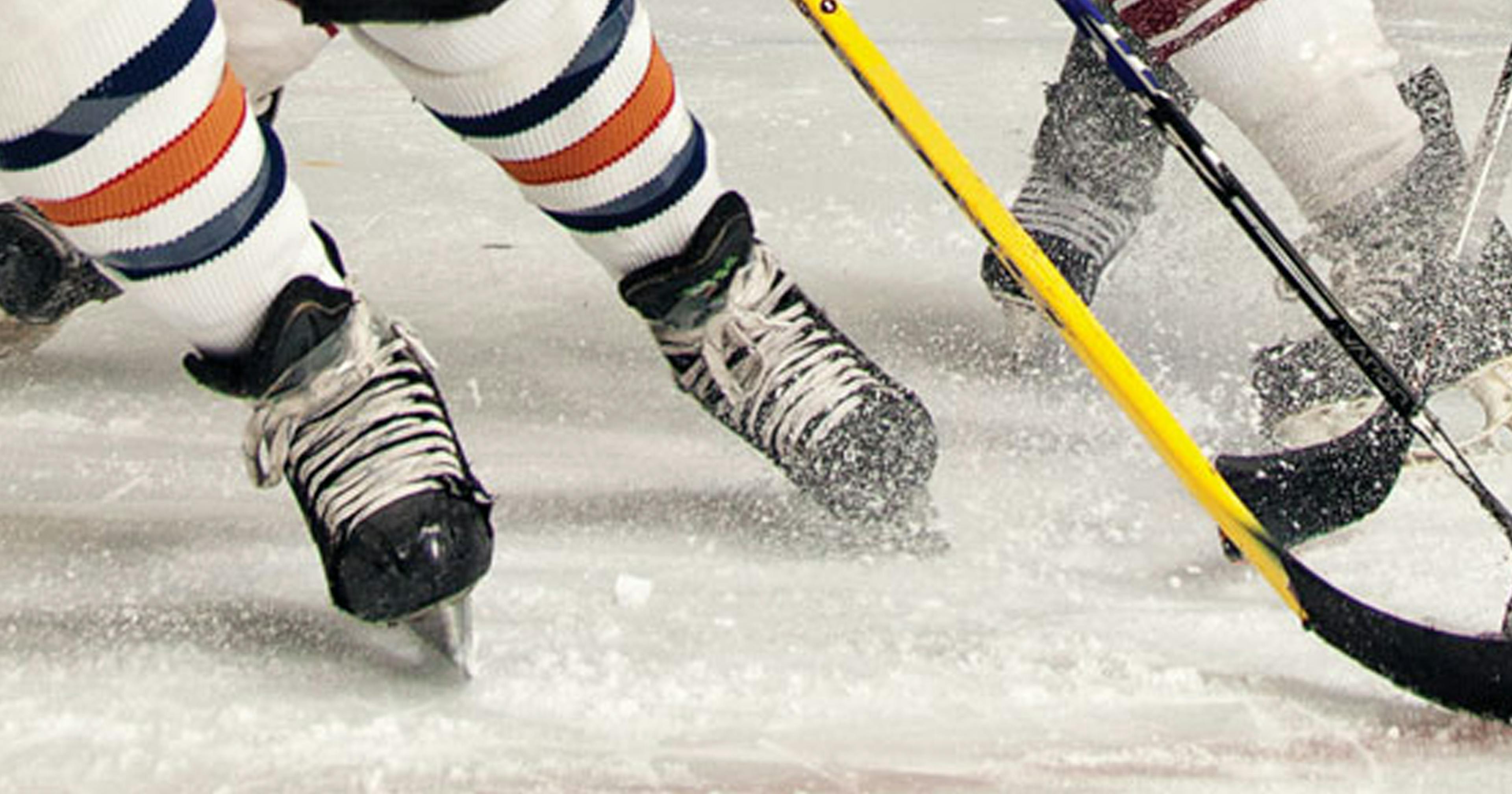 Close-up of hockey player's skates