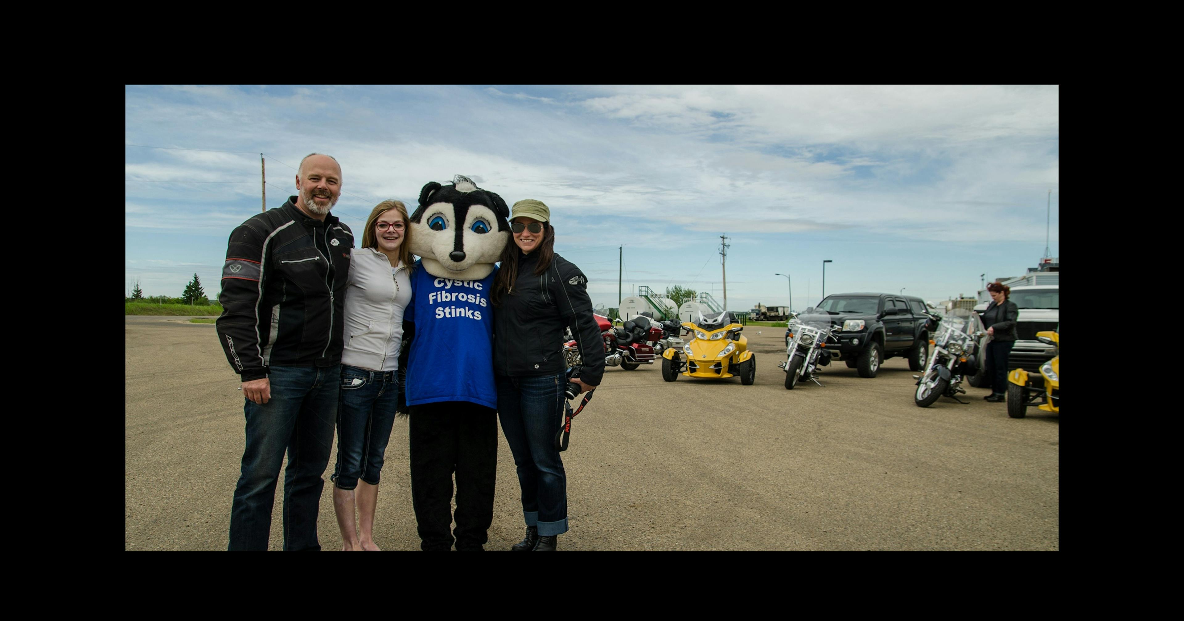 Riders with the CF mascot