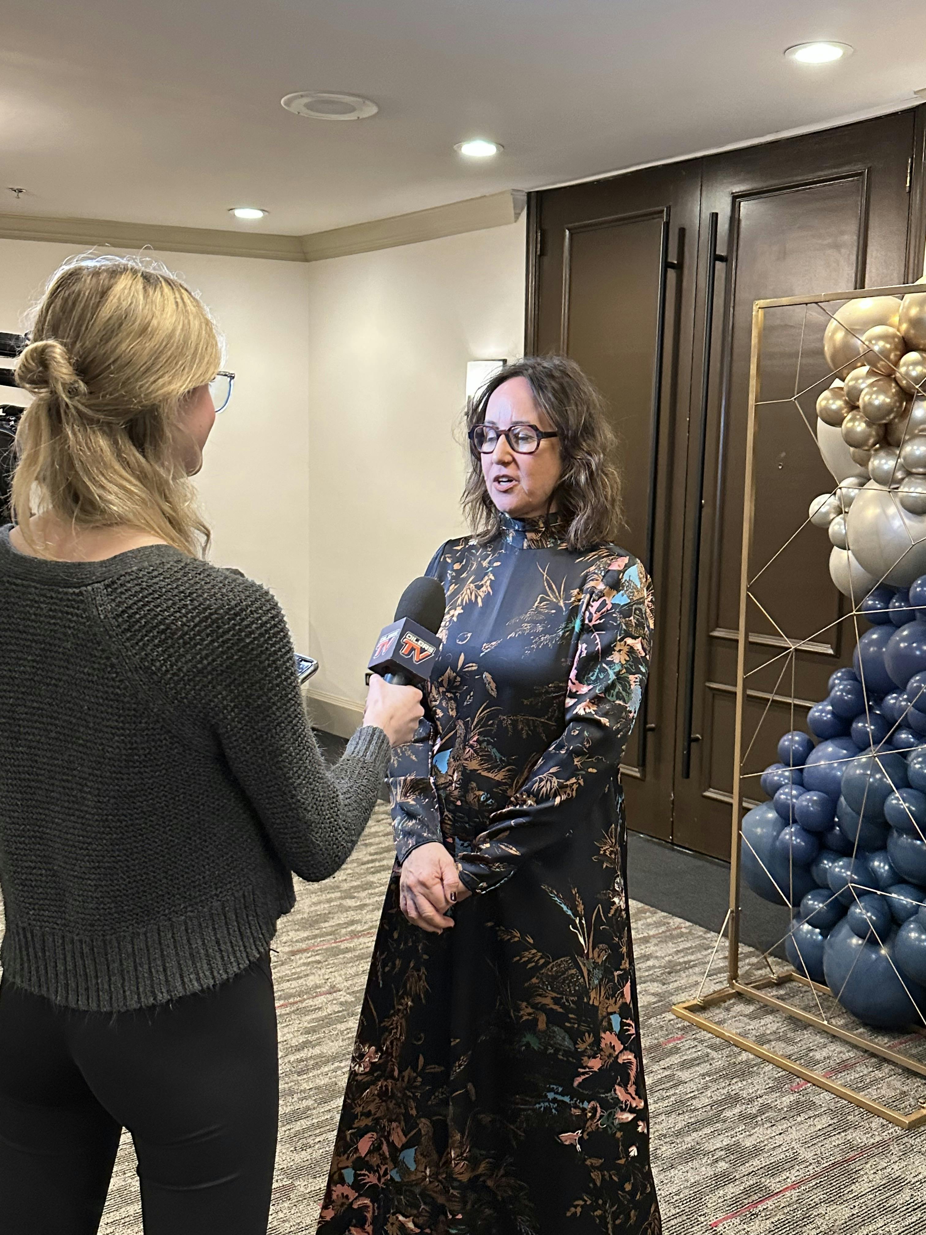 Kelly Grover, CF Canada CEO participates in an interview at the faceoff for CF gala