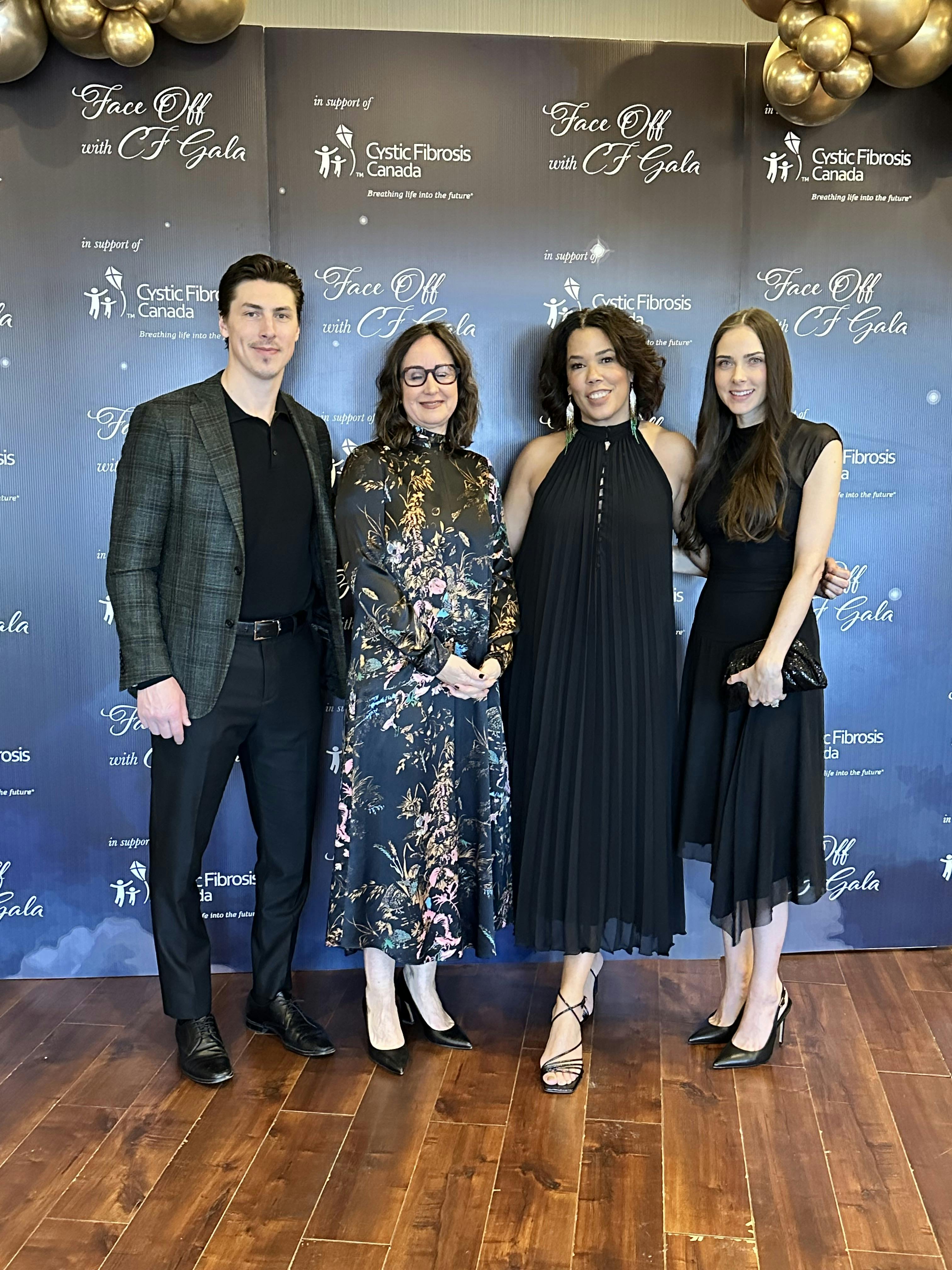 Kelly Grover, Phoebe Dey post with Ryan Nugent Hopkins and wife