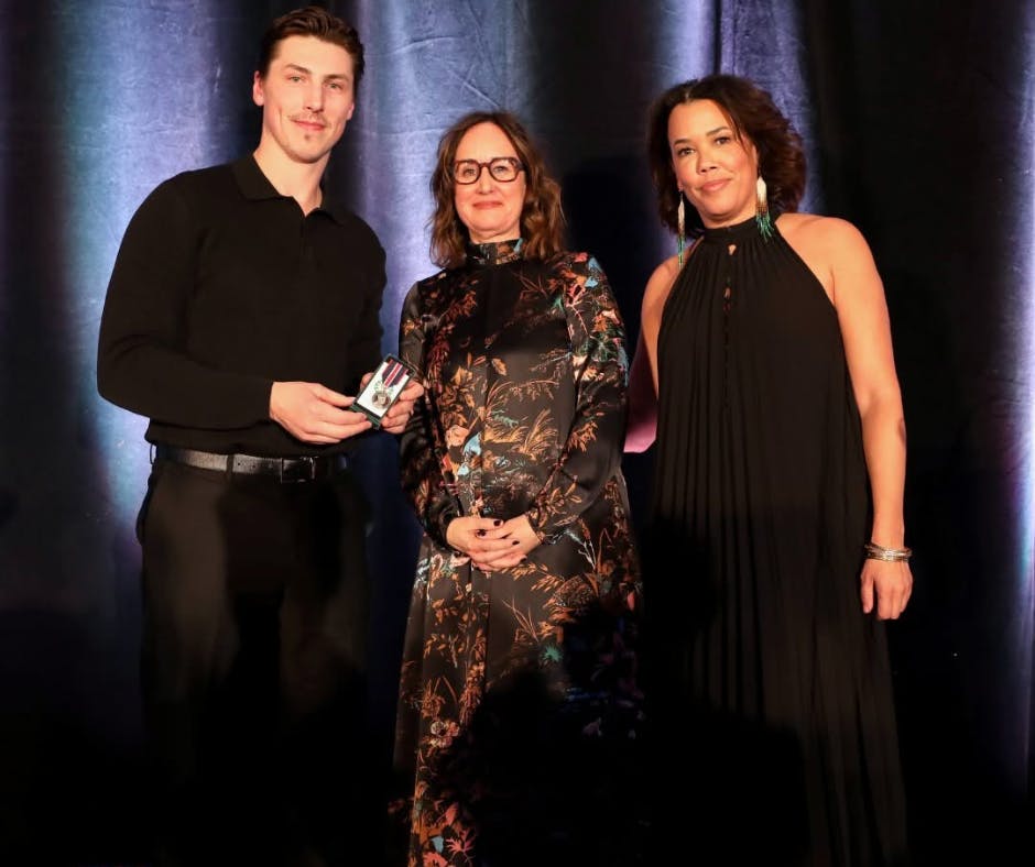 Ryan Nugent-Hopkins accepts his King Charles III award