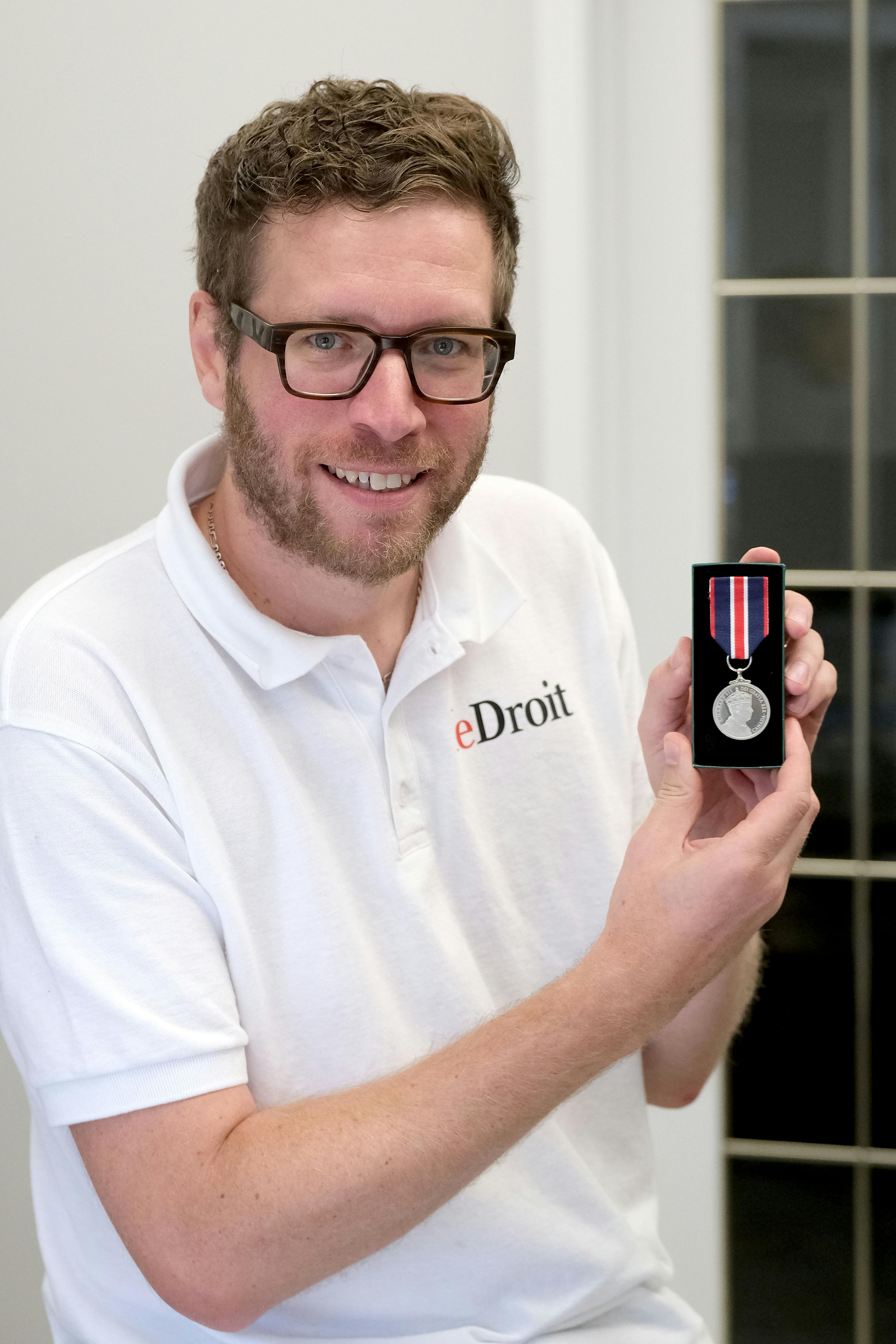 Daniel Leblanc poses with his KCCM