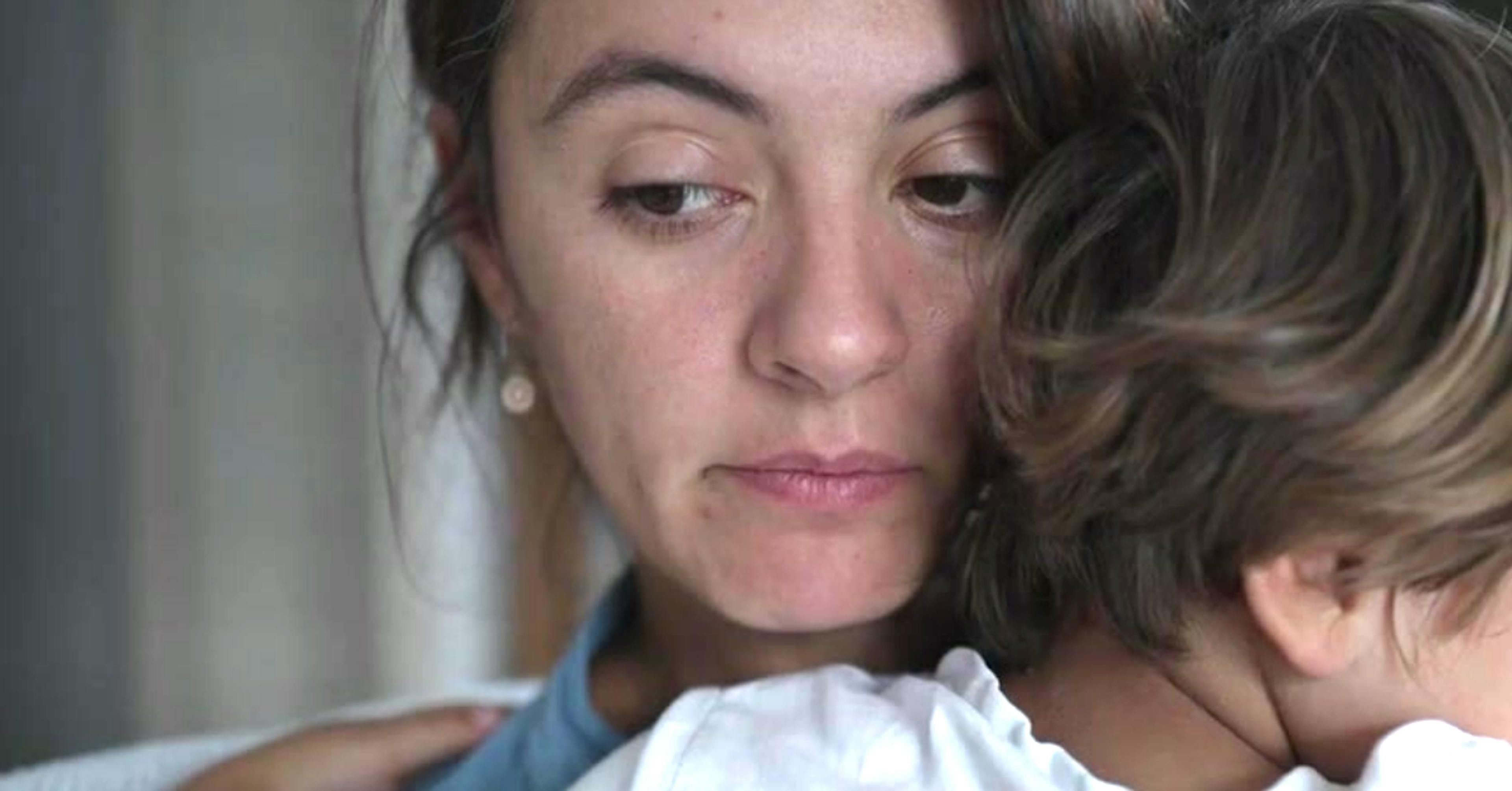 Mother holding child