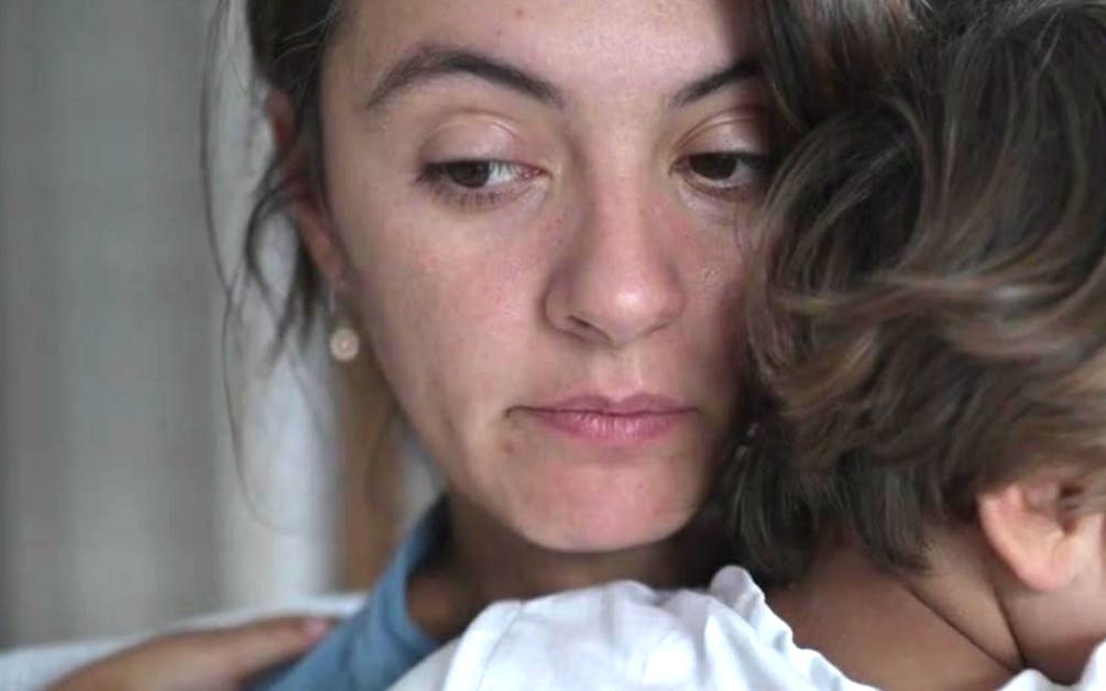 Mother holding child