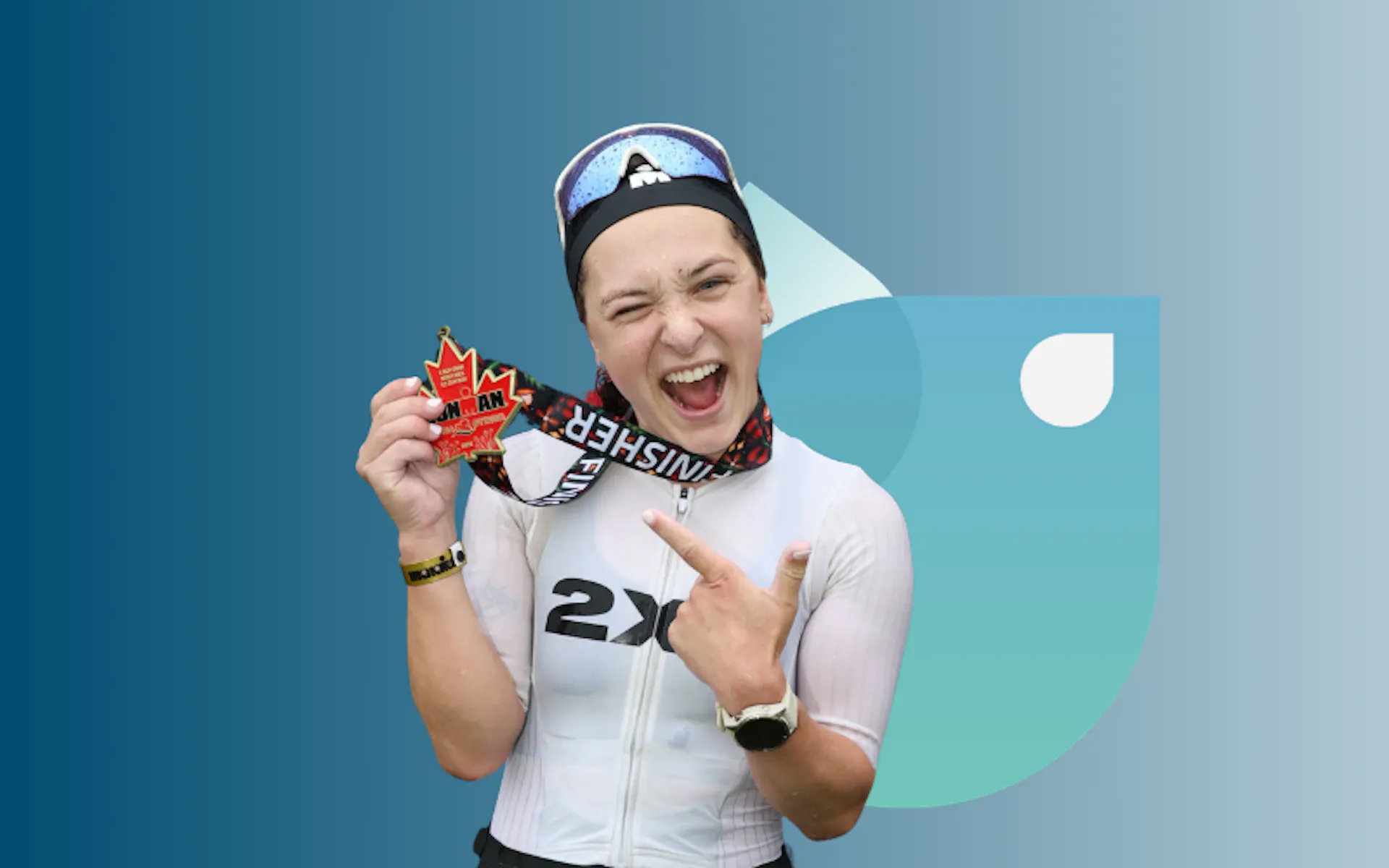 Emma with her Ironman medal