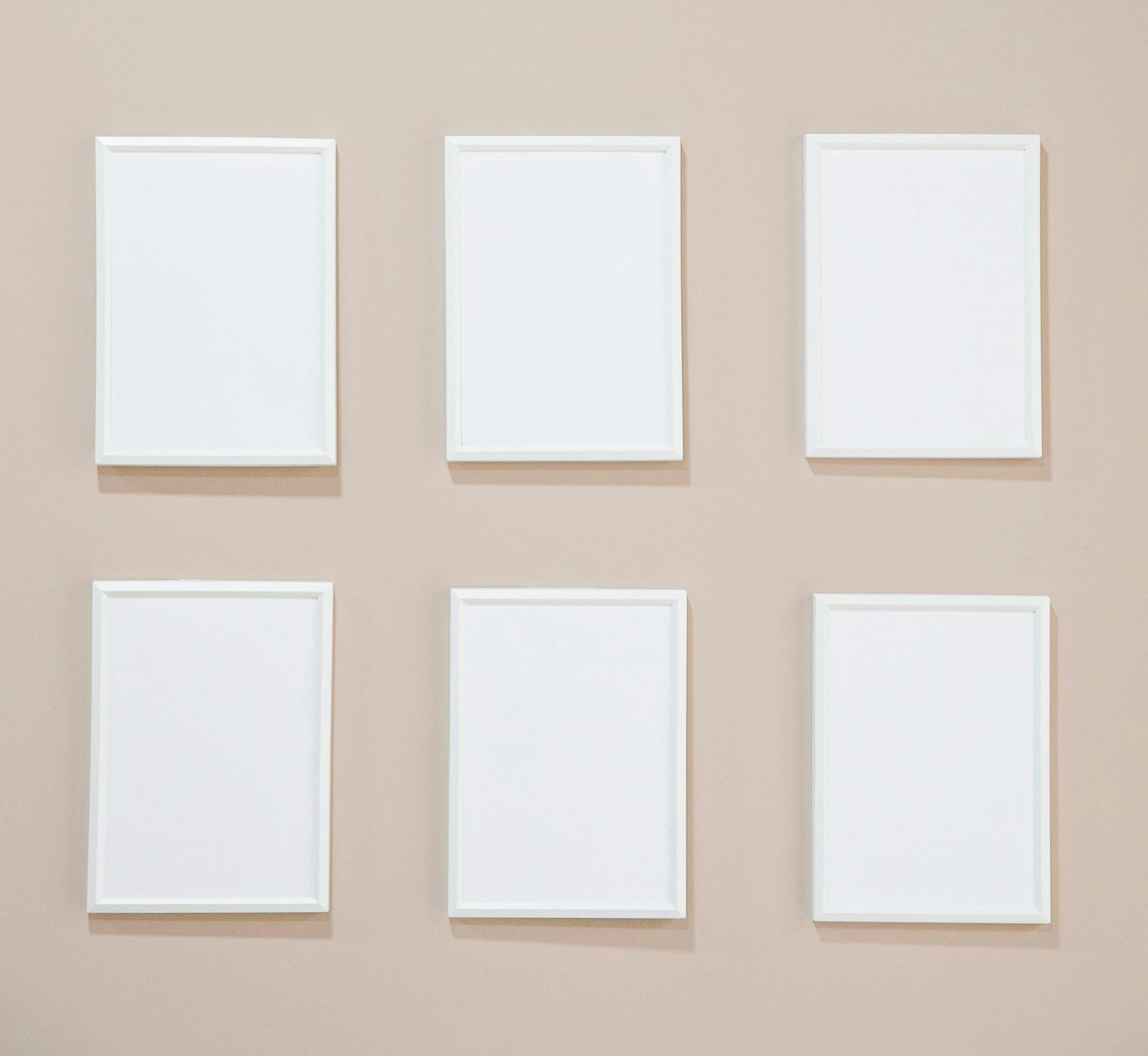 Empty white photo frames