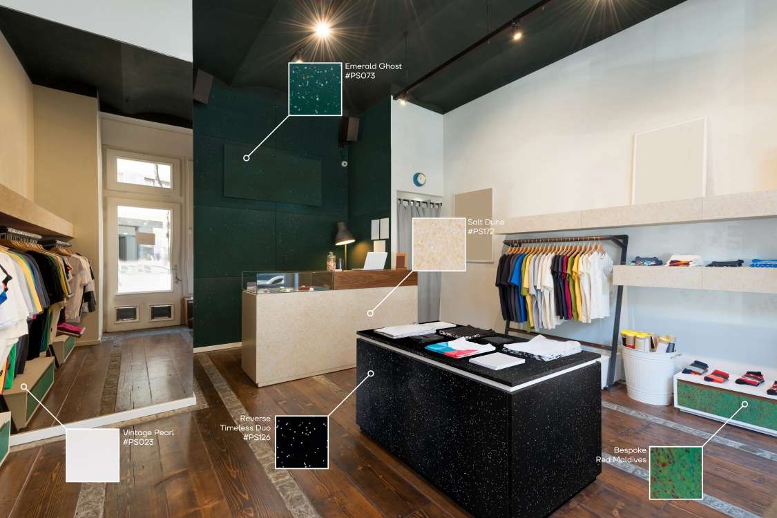 Une boutique de vêtements avec du mobilier en plastique recyclé