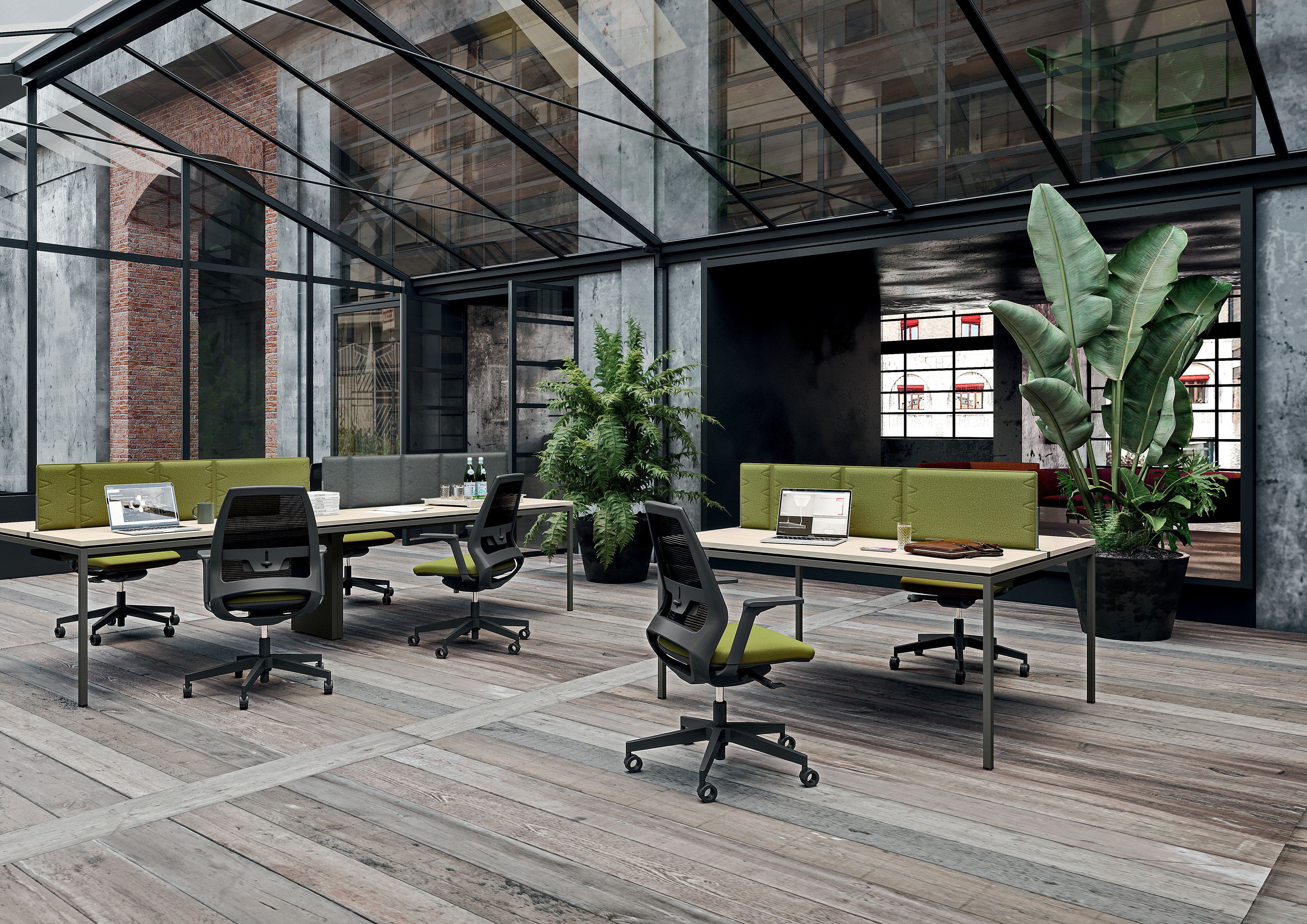 Un espace de travail avec des bureaux des chaises et des plantes