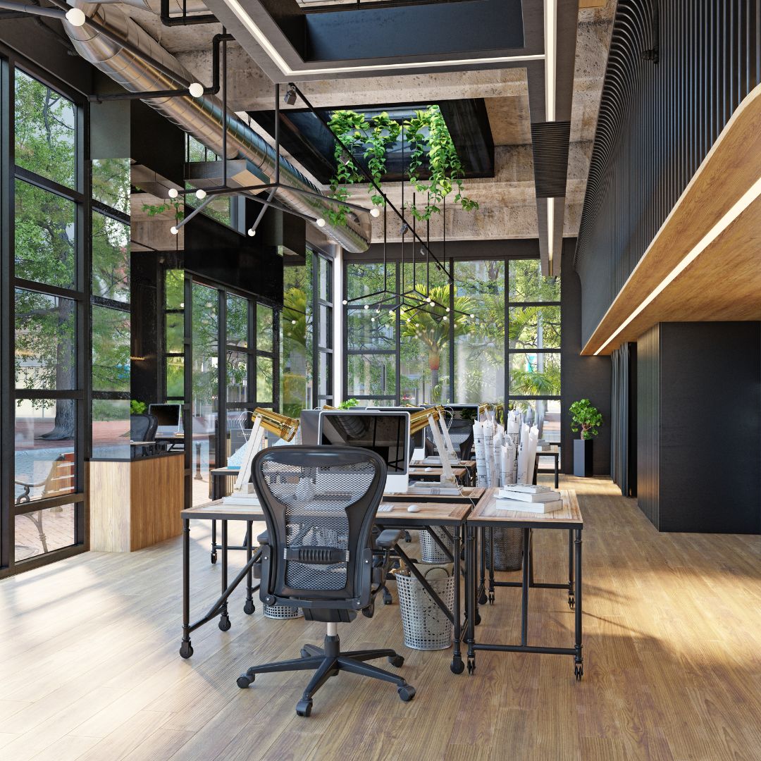 Un espace de travail végétalisé avec des bureaux, des chaises et des plantes