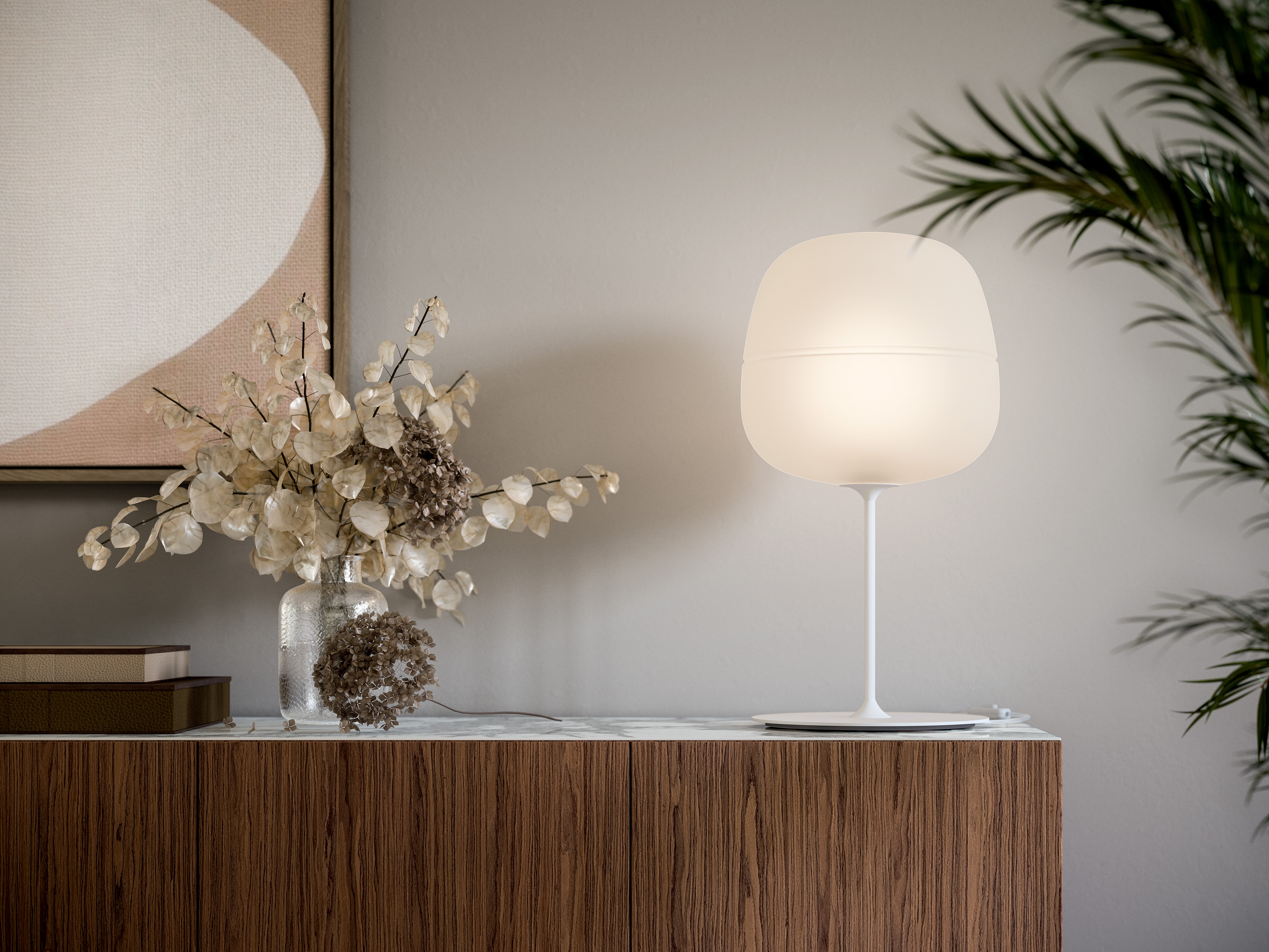 Commode avec une petite lampe design dessus