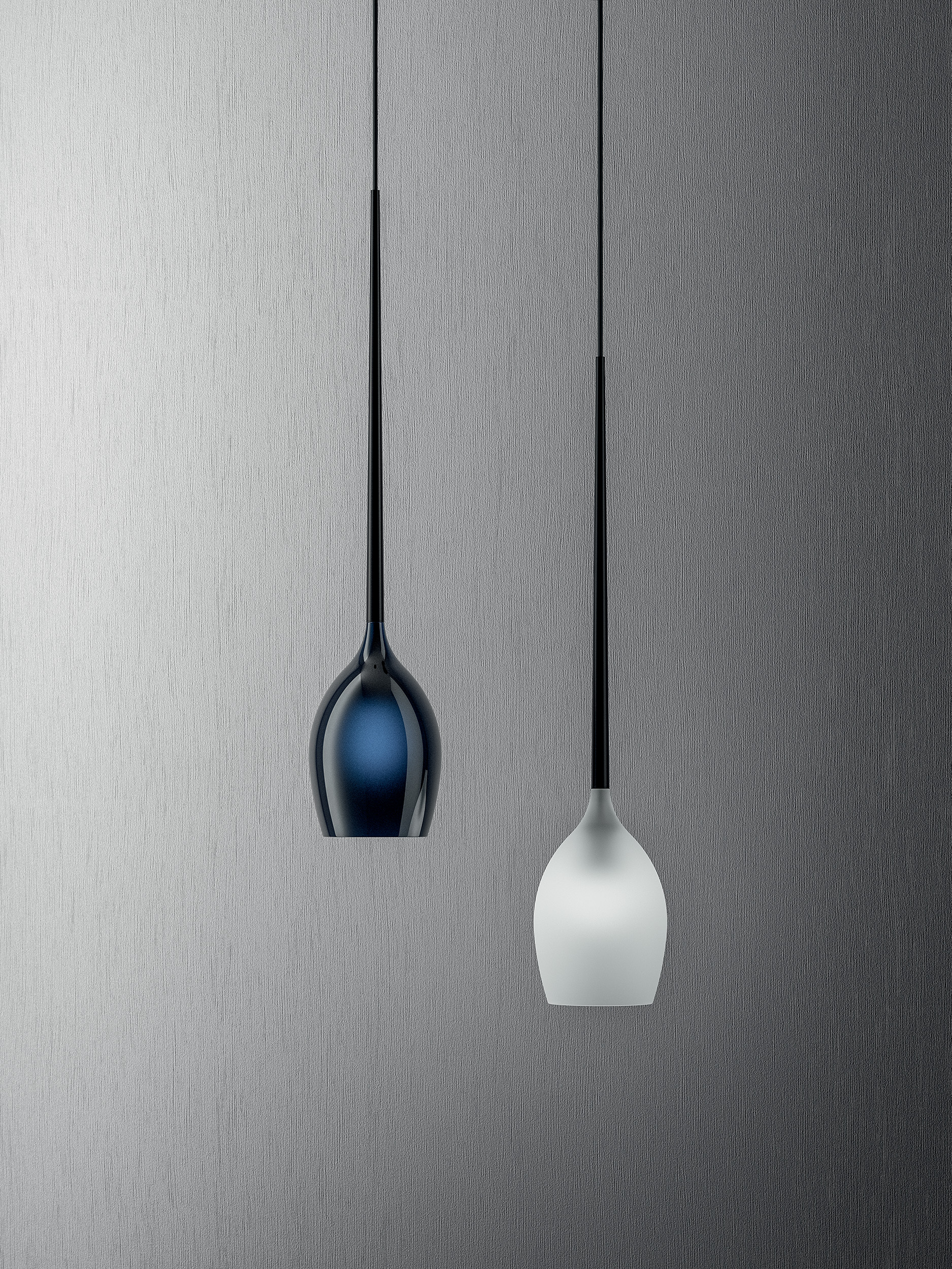 Vue de face de deux luminaires noir et blanc design, produit de Dacota