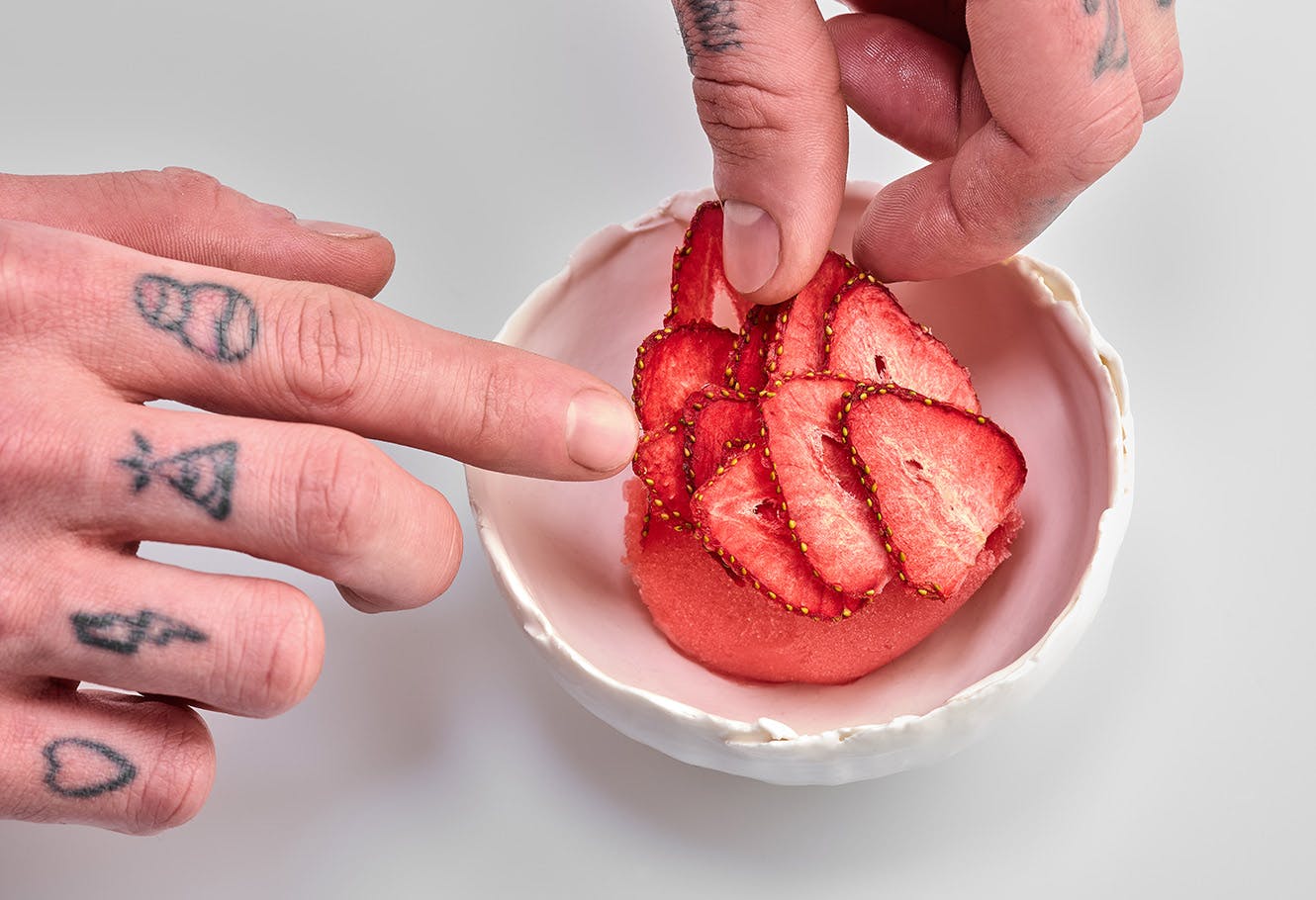 Strawberry sorbet and fresh strawberry slices.