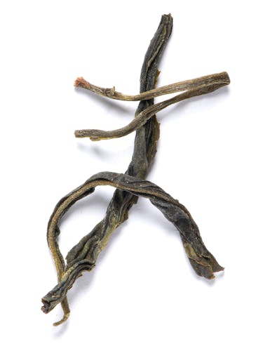 Green tea leaves in bulk.