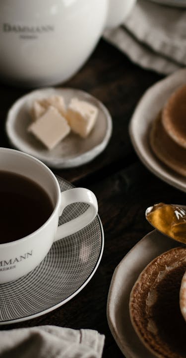 Breakfast table with a cup of tea.