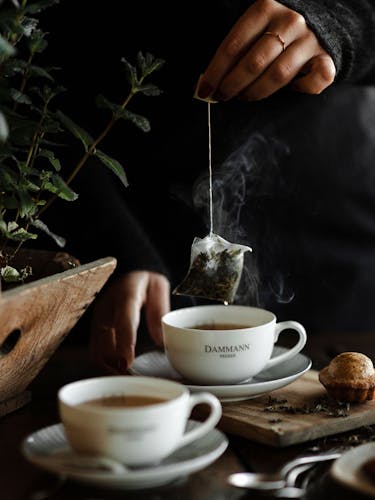 Infusion of a tea bag in a cup of tea.