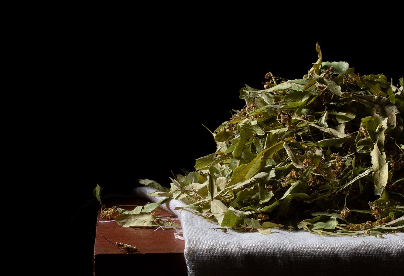  Loose linden leaves on a table.