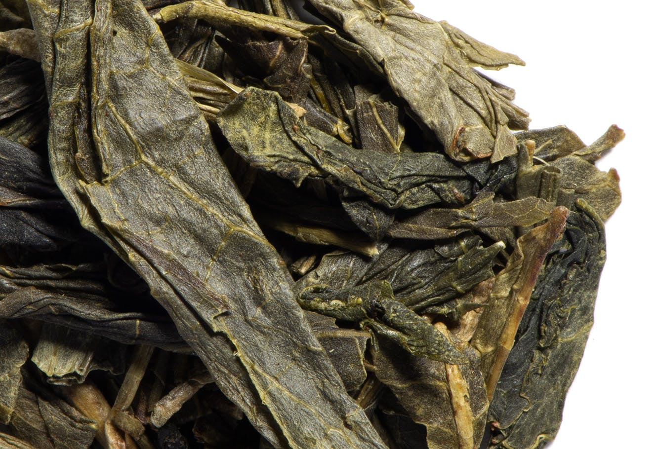 Green tea leaves in bulk.