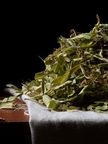 Loose linden leaves on a table.