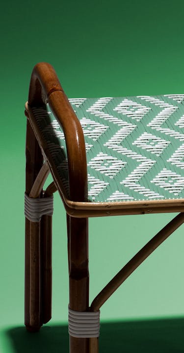 Rattan table by Maison Louis DRUCKER.