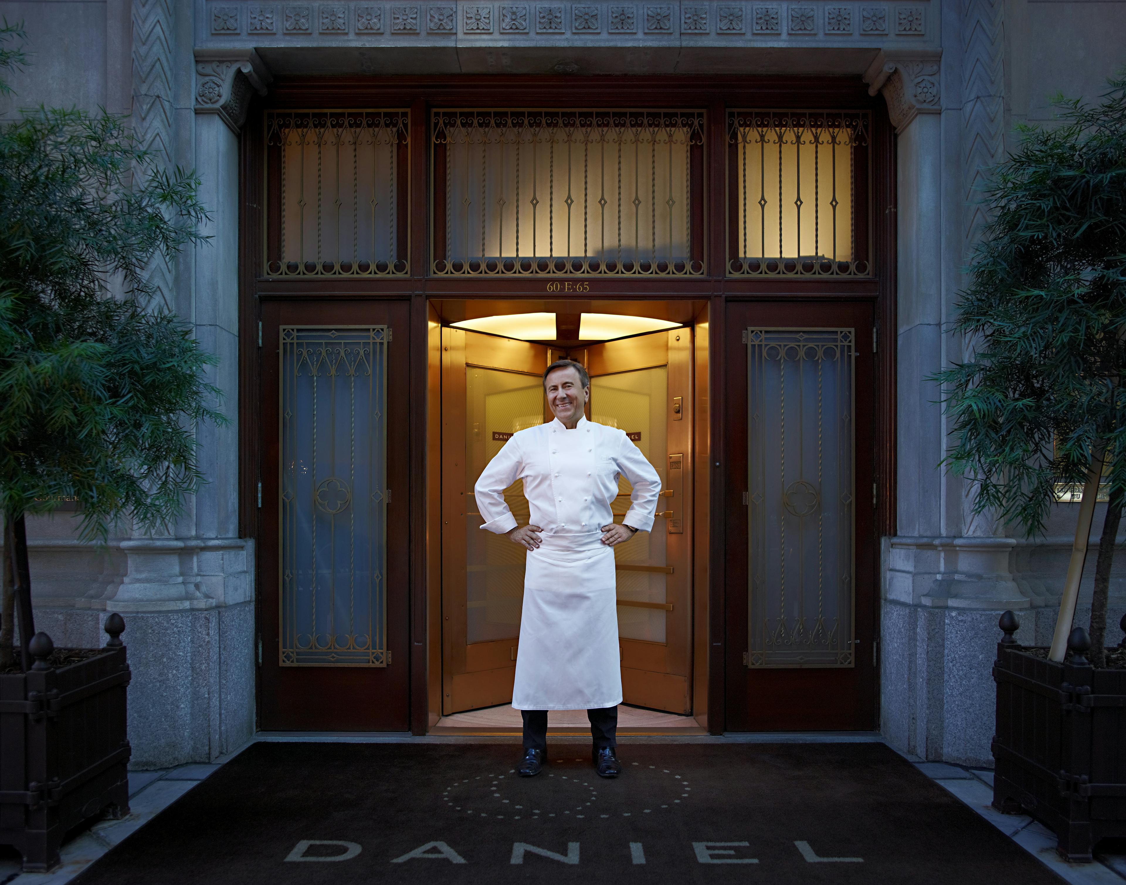 Daniel Boulud in front of Restaurant Daniel
