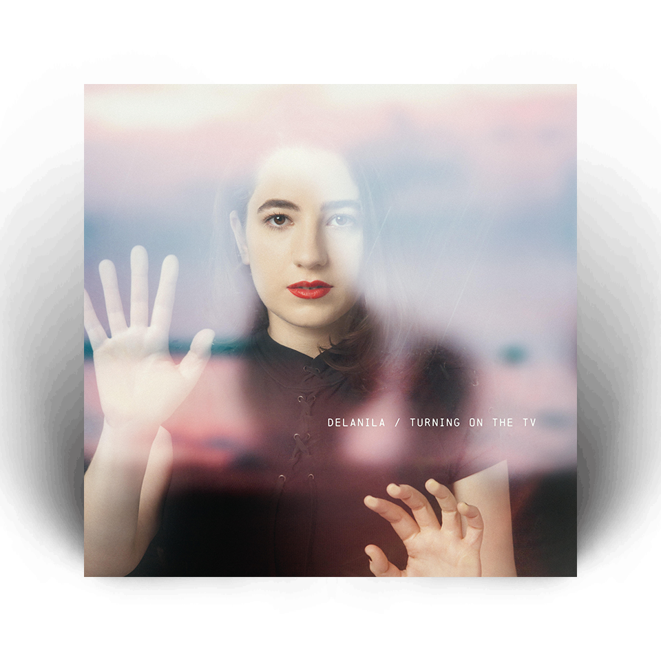Cover art for DELANILA's "Turning on the TV"