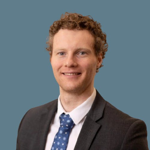 headshot of Calum who is an associate at dark alpha capital is