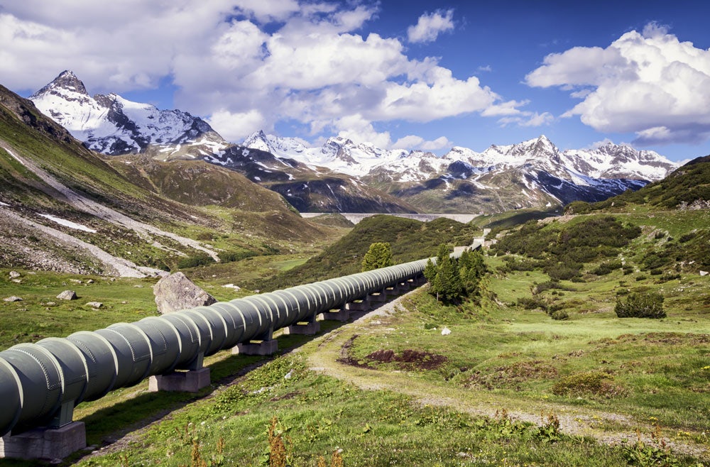 Pipeline surrounded by nature and mountains