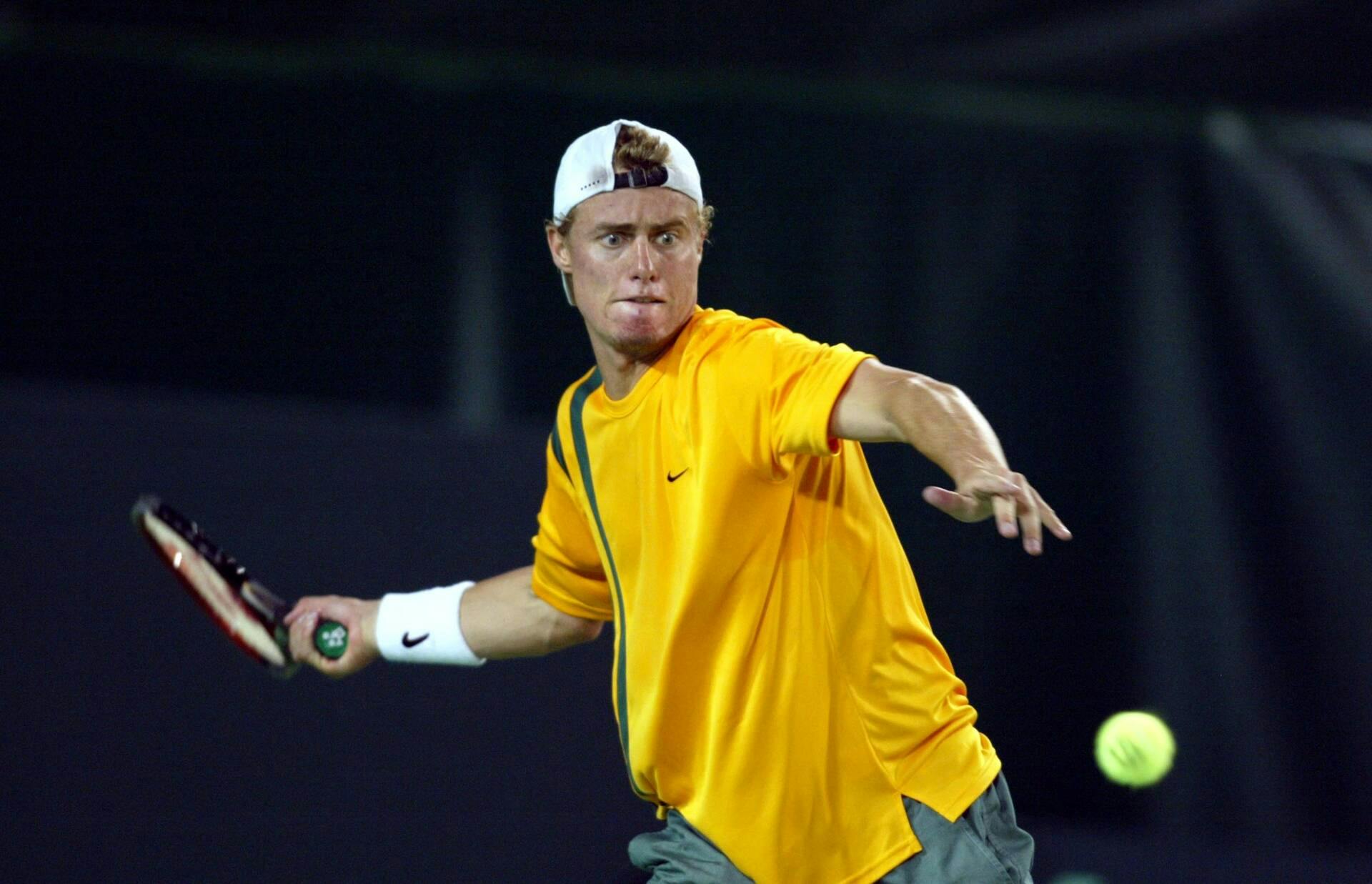 Lleyton Hewitt in action against Roger Federer in 2003
