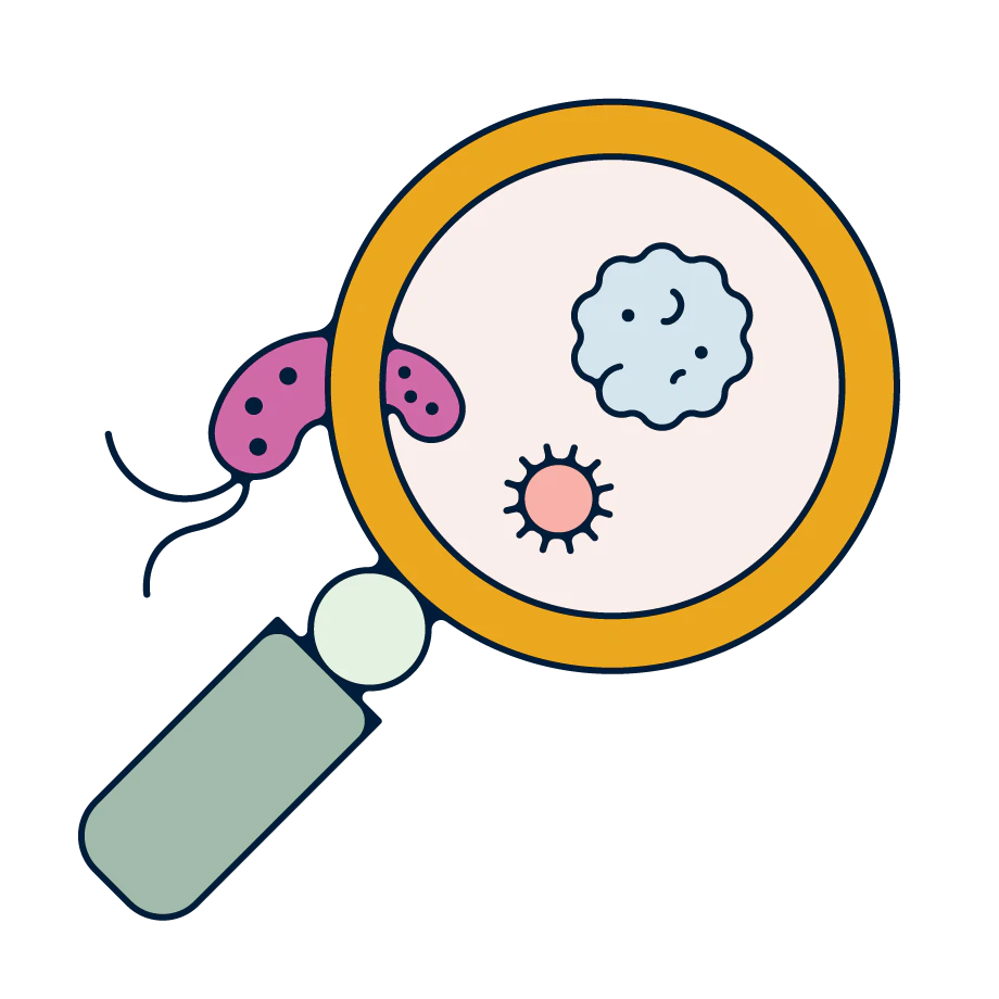 A magnifying glass next to a bacterial sample.