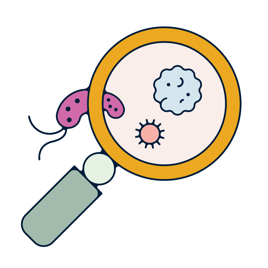 A magnifying glass next to a bacterial sample.