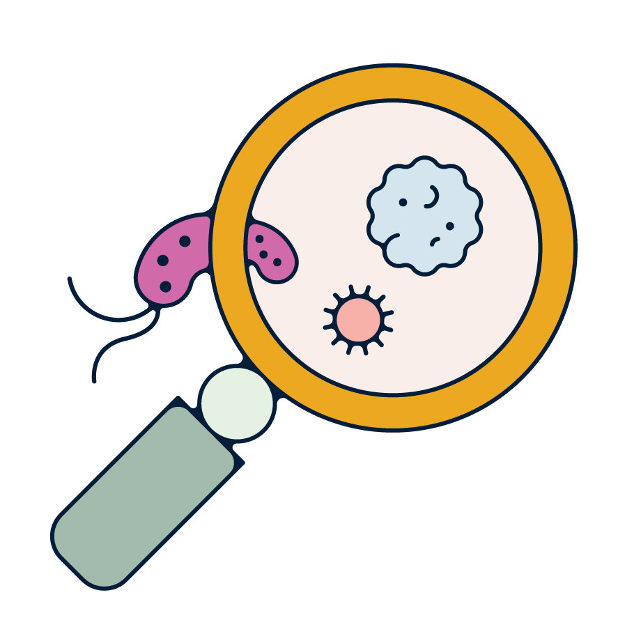 A magnifying glass next to a bacterial sample. 