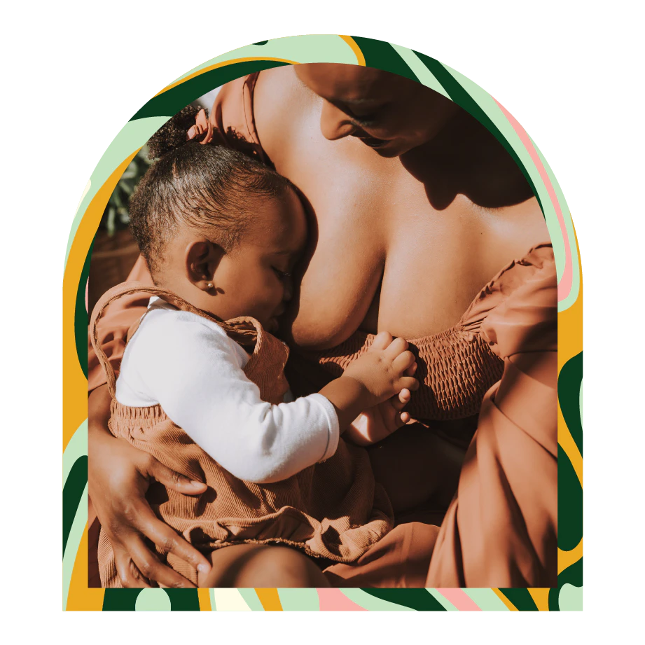 A person nursing a child.