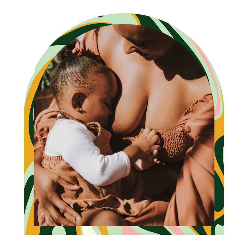 A person nursing a child.