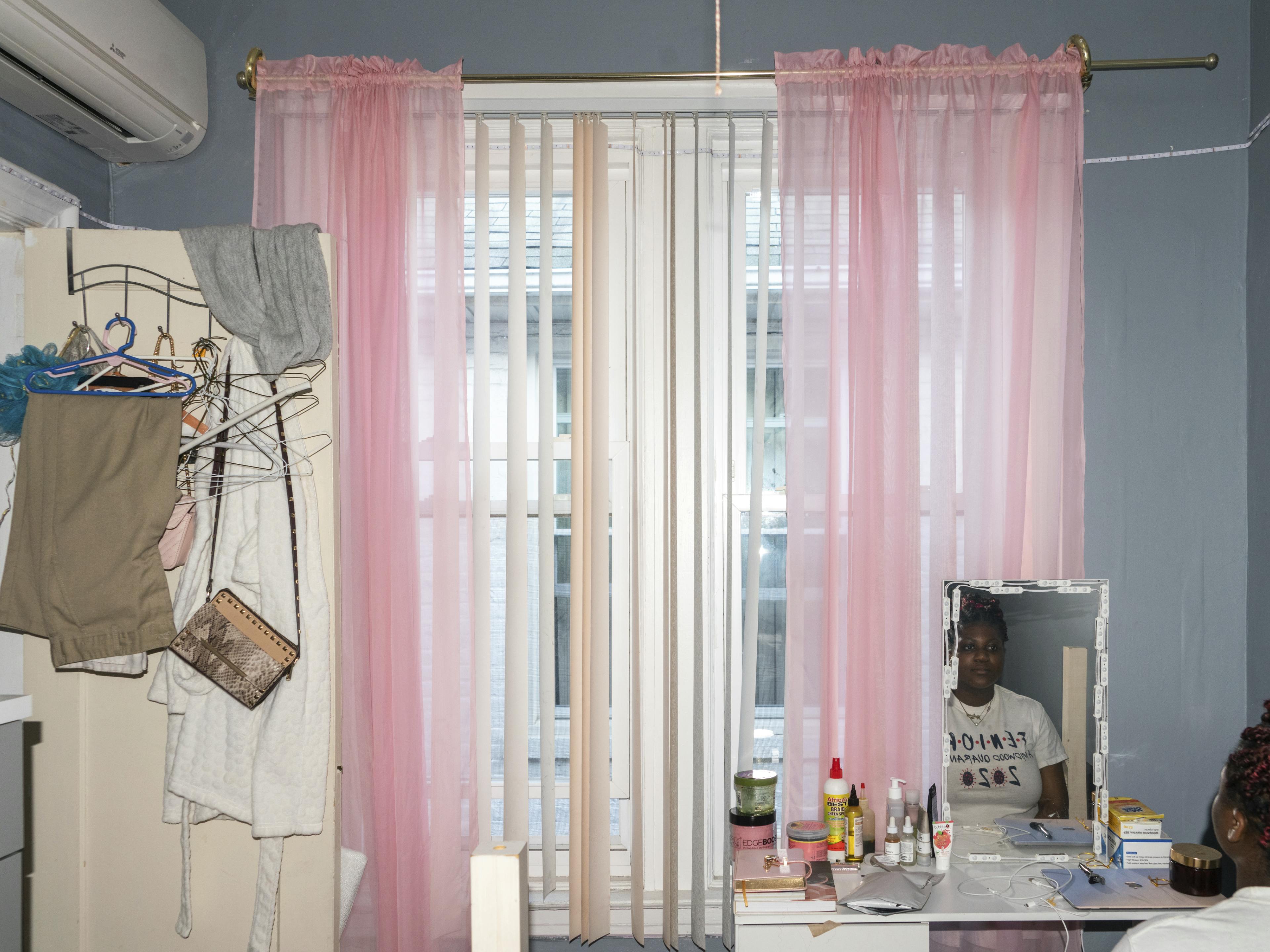 Julissa in her room in New York City, USA. Photography by Peter Van Agtmael.