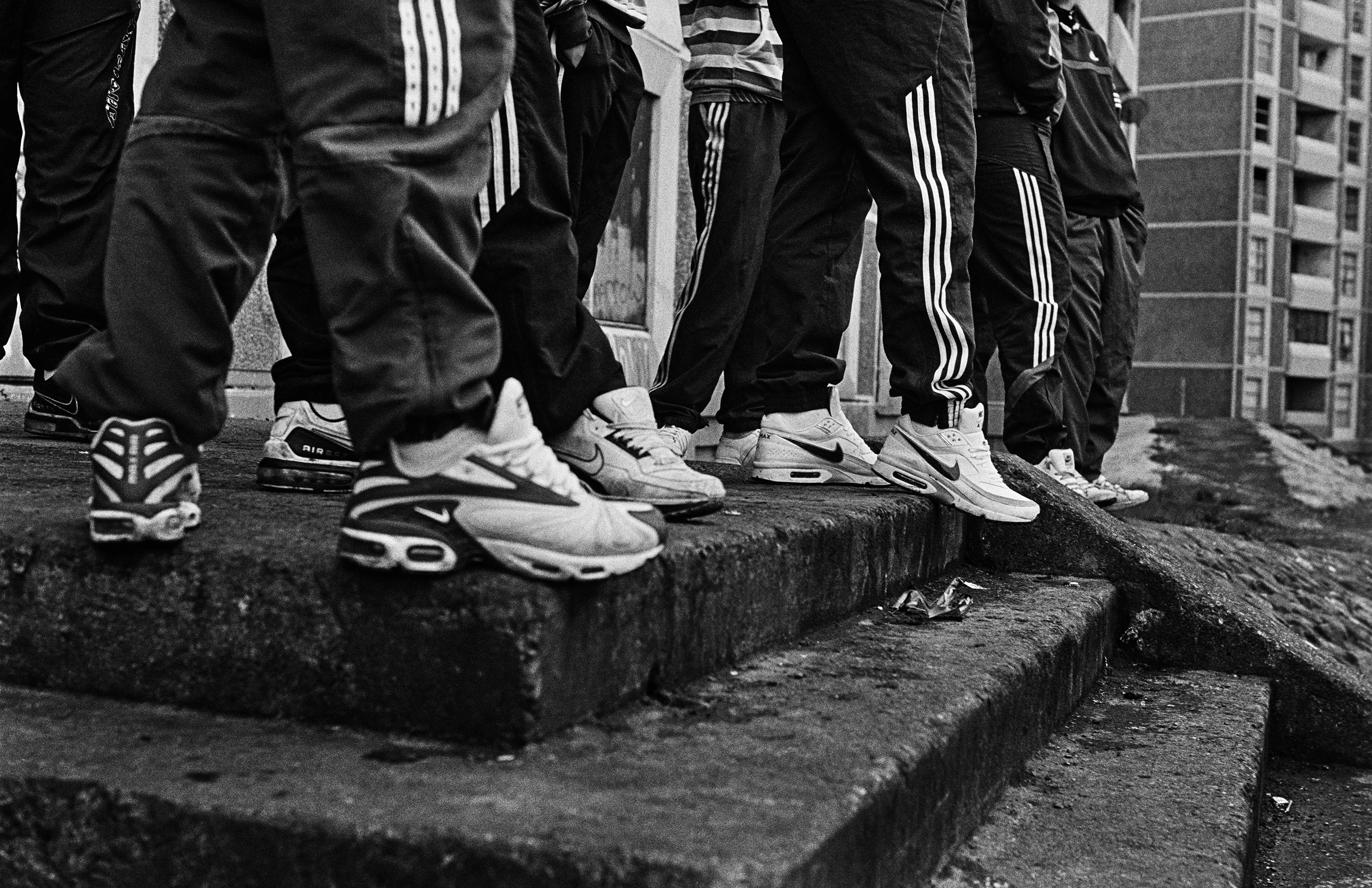 Photograph from Ross McDonnell showing young irishmen's sneakers.