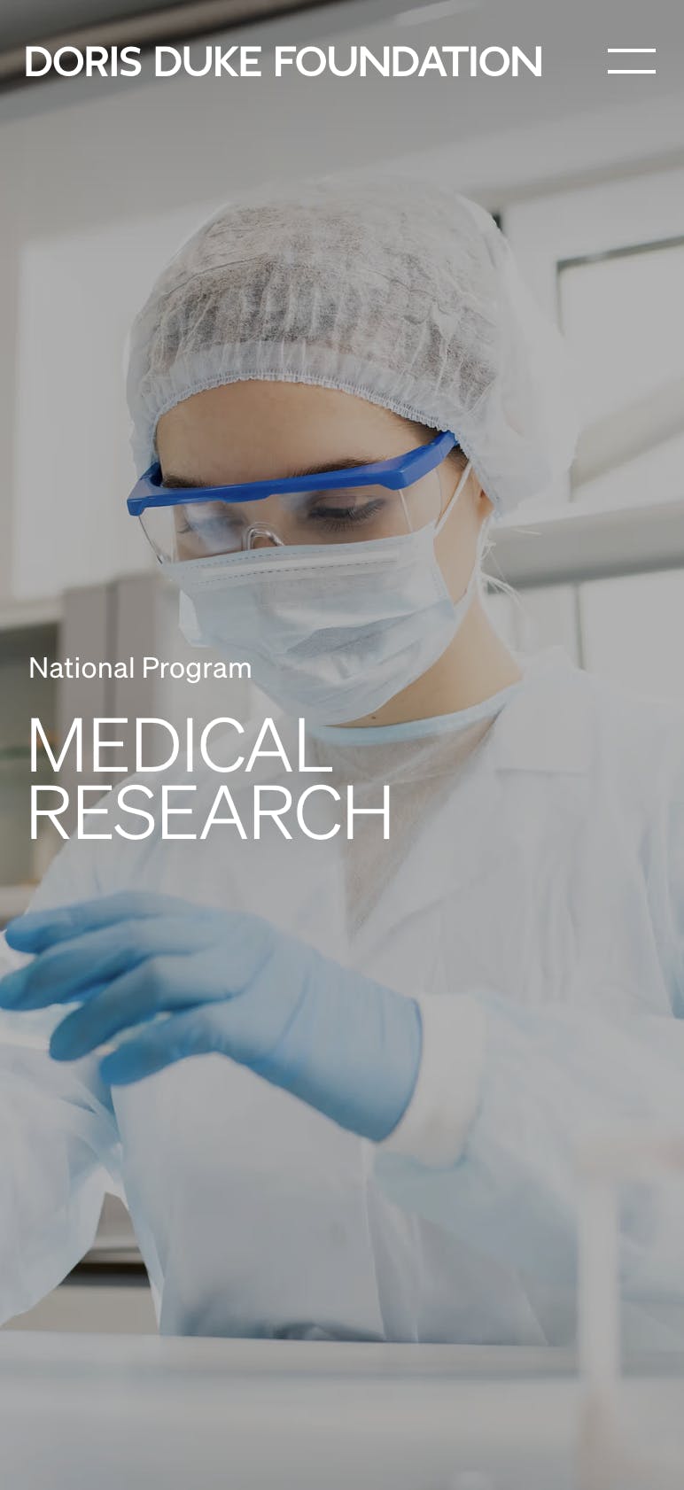 Full-bleed image of a lab scientist with the title "Medical Research" on top.