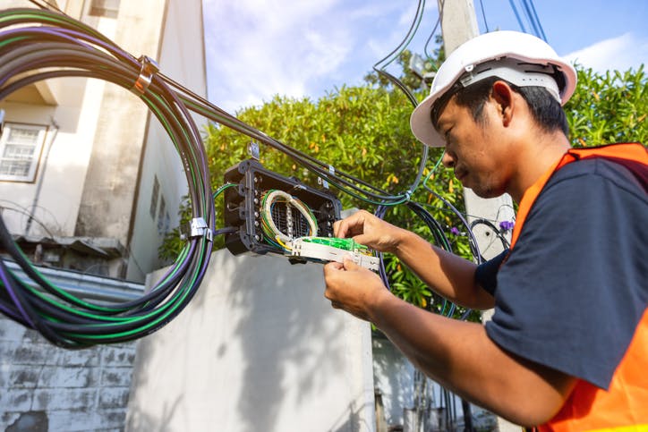 Connect Fibre Technician connecting cables for Openreach's PIA compliance