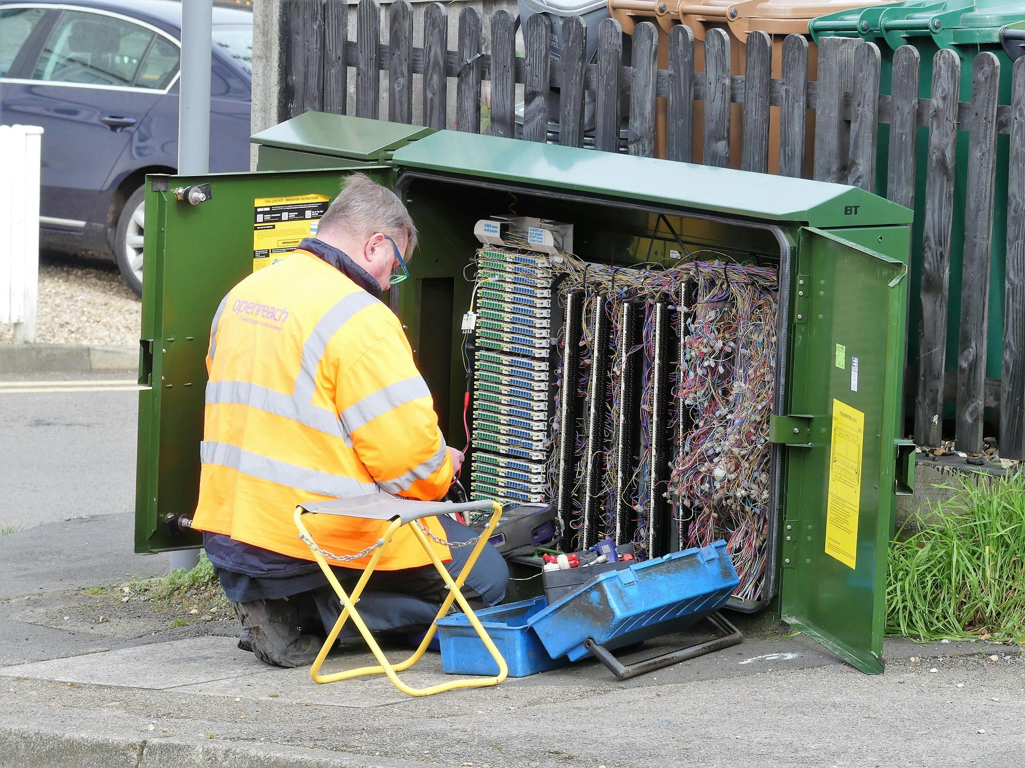 Openreach Fibre Optic Technician repairing a street cabinet - Deepomatic