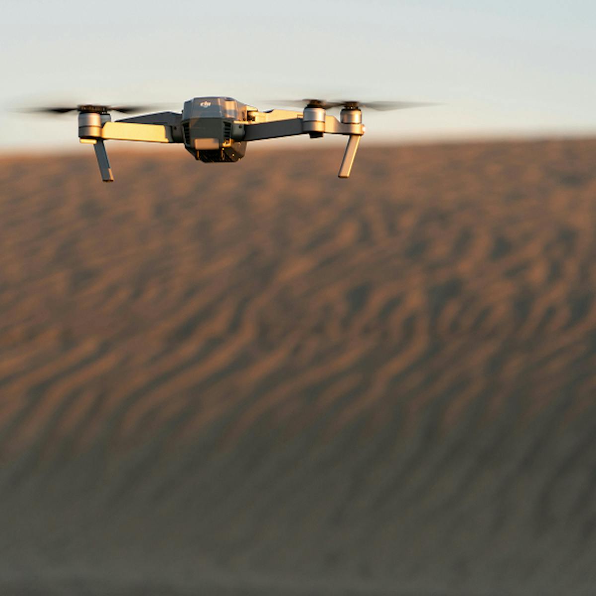 Drone in arid landscape.