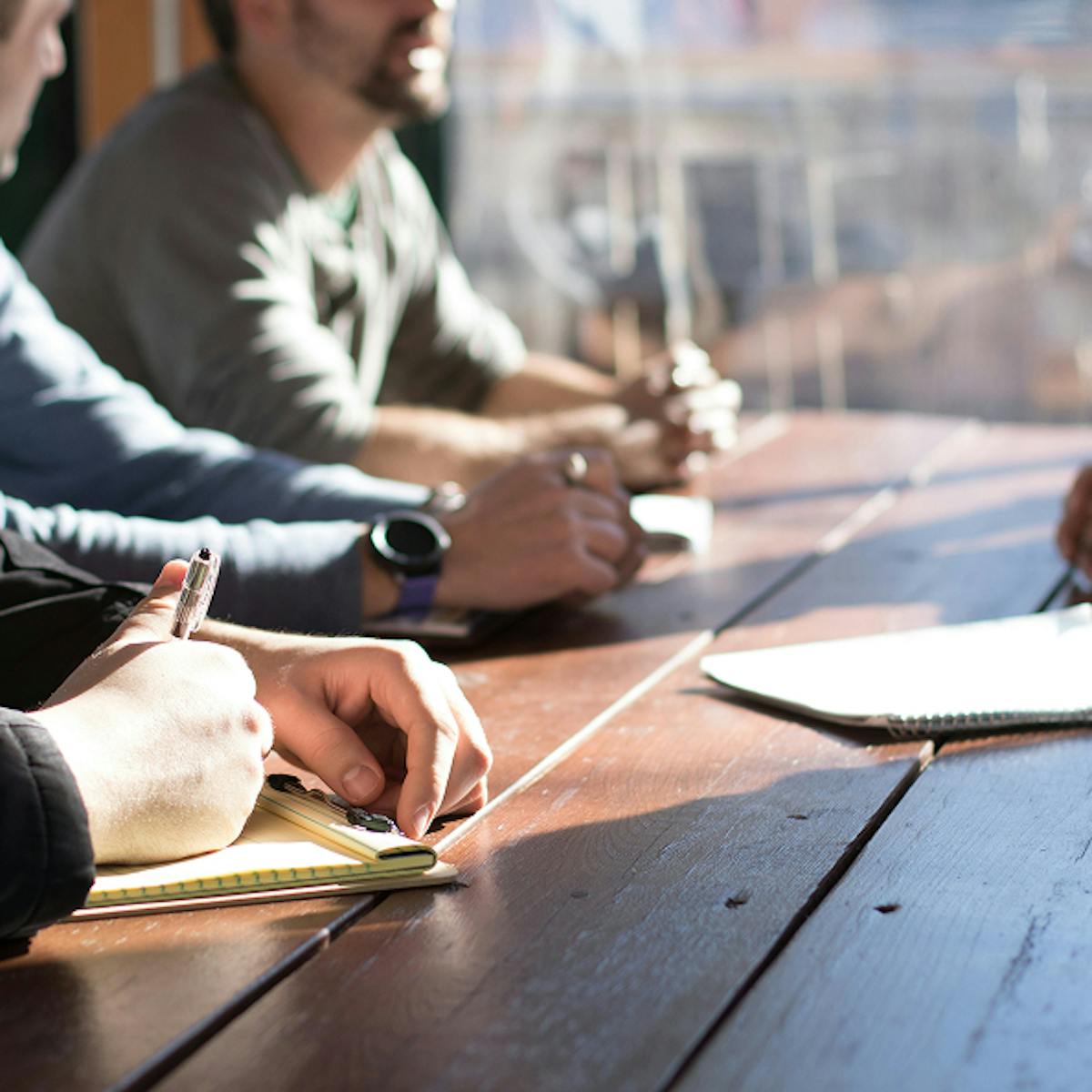 People sitting together in a meeting.