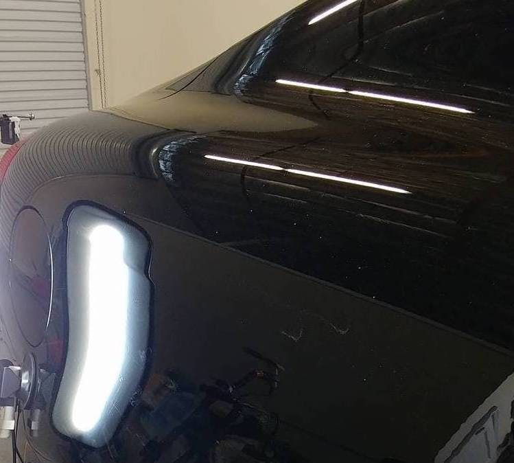 Fixing dents in car